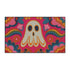 A rectangular polyester doormat with a vibrant, psychedelic design on a hot pink background. In the center is a cute, cartoonish ghost in off-white with yellow and orange outlines; it has large, dark, expressive eyes. The ghost is surrounded by a maximalist pattern of 70s-style floral motifs and puffy clouds in shades of teal, blue, orange, and light pink. Two small, colorful rainbows arc over the ghost's shoulders. The doormat has a durable, textured surface and is framed by a sleek black trim.